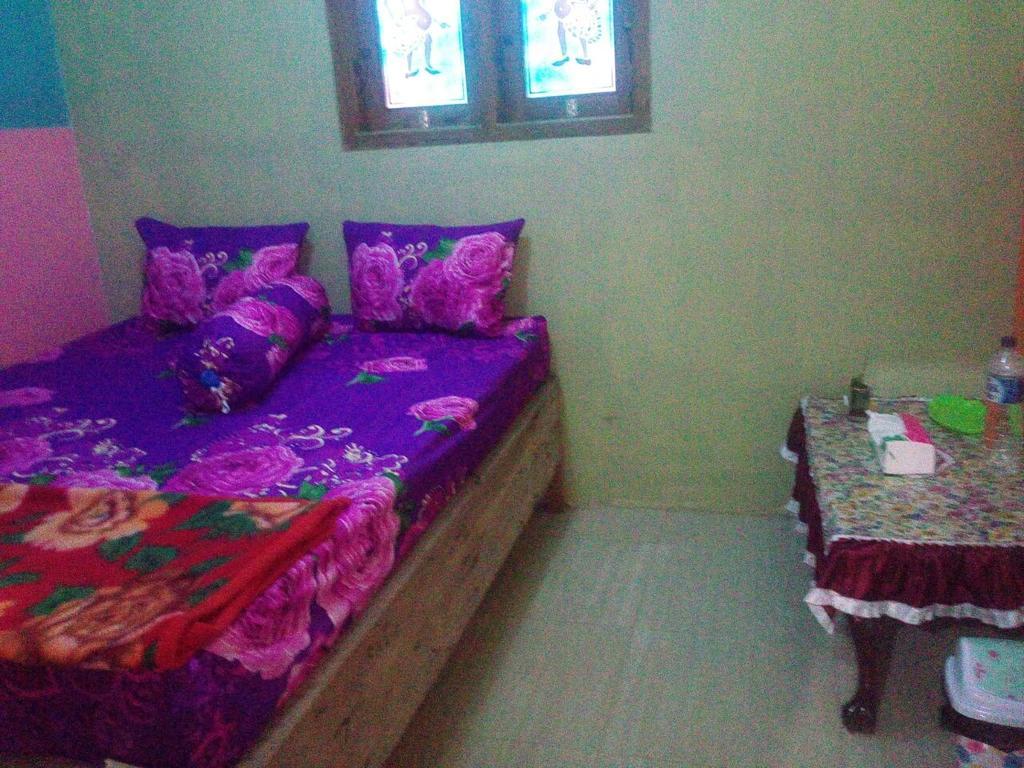 Yunior Guesthouse Tamansuruh Exterior photo